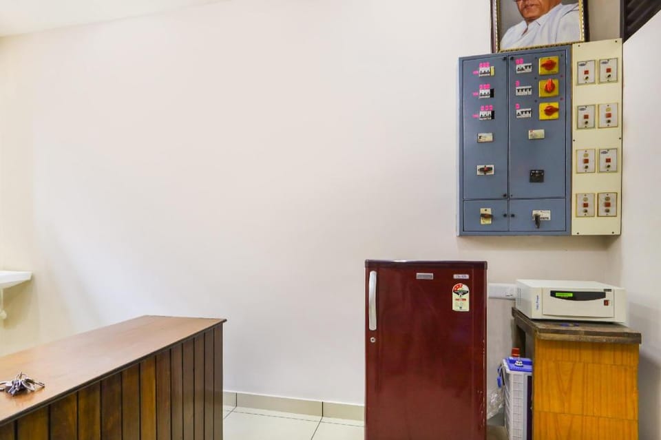 Hotel O Aluva Railway Station Formerly Menachery Tourist Home Hotel in Kochi
