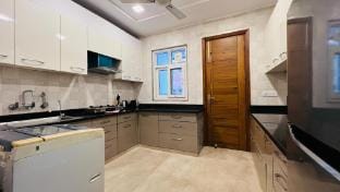 BluO 2BHK City Centre - Balcony, Lift, Terrace Apartment in New Delhi