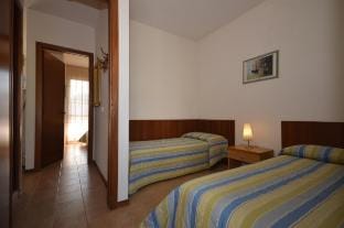 Chic Coastal Charm in a Central Location Apartment in Bibione