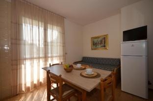 Chic Coastal Charm in a Central Location Apartment in Bibione