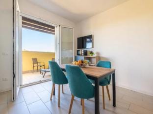 New holiday home with sea view terrace Apartment in Sardinia