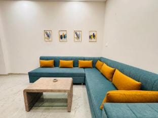 Home Escape 1BHK Bliss with Balcony Near Mahalaxmi Apartment in India