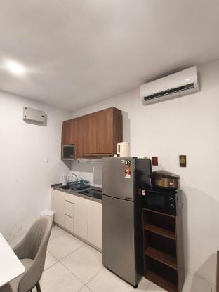 The PODIUM Kuching Studio HomeStay E36B @ 4PAX Apartment in Kuching