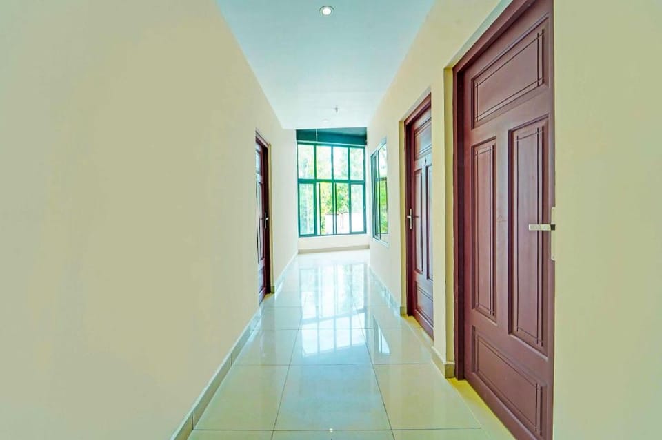 Hotel O Kollam Bypass Kureepuzha Hotel in Kerala