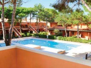 Stylish Holiday Home with Pool Access in Private Village Apartment in Bibione