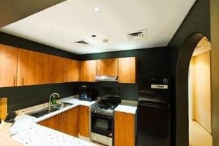 369 Stays- 1 Bedroom Apartment in Sports City Vacation rental in Dubai