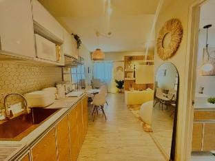 Charm Soleil-1BR, Pool, WiFi+Netflix & Walk to SM Vacation rental in Calabarzon