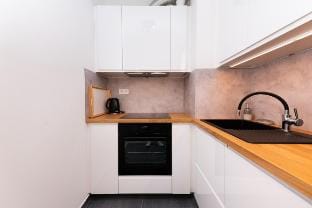Chic206 Retreat: Modern 1BR Gem with Balcony by NW Vacation rental in Budapest