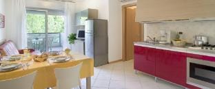 The Holiday You Deserve in a Poolside Paradise Resort Apartment in Bibione