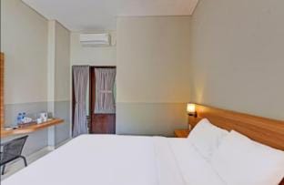 BMMS Hotel -5 Minutes to the Beach By Micky Studio Vacation rental in Kuta