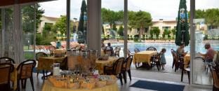 Refined Holiday Living  Pool, Greenery and Comfort Await Apartment in Bibione