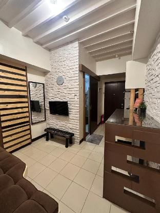 Cozy escape by Selling Sunsets Moldex Residences Vacation rental in Baguio