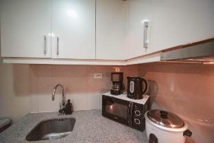 Voguish Urban Cozy Home in Uptown BGC Apartment in Makati