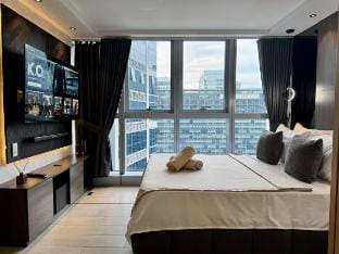 Stylish 1br inside BGC at Uptown Parksuites - 24k Apartment in Makati