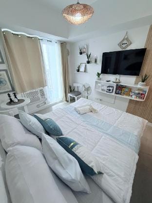 Cozy Room | Pool View | Staycation @ Azure North Apartment in Calabarzon
