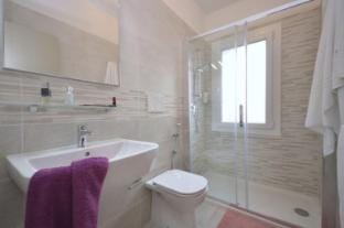 Treat Yourself to a Stylish Stay with Pool Access Apartment in Bibione