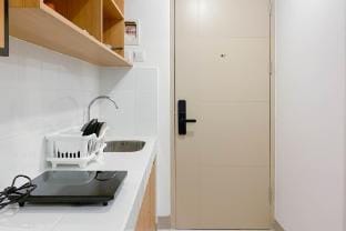Homey Studio Apartment Tokyo Riverside By Travelio Apartment in West Java