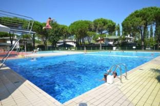 Relax and Unwind at Our Fully Equipped Resort with Pool Apartment in Bibione