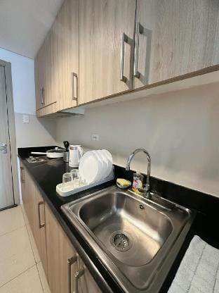 Condo with pool view by Puff Staycation Vacation rental in Pasay