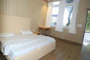 Restinn Kemptyfall–4BR Mountain View by homeyhuts Vacation rental in Uttarakhand