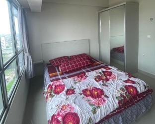 Elegant White Furnished Studio Apartmen Springlake Apartment in West Java