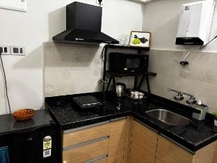 Touch Of Grey- 1Bhk W 2BL & 12FL Vacation rental in Pune