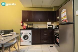Experience Luxury 1BR Living at Autumn-1A in JVC Vacation rental in Dubai