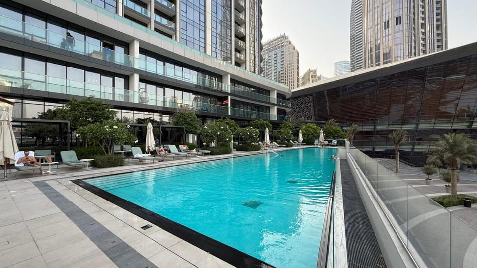 2BR Walk to Burj Mall & Opera Pool View Apartment in Dubai