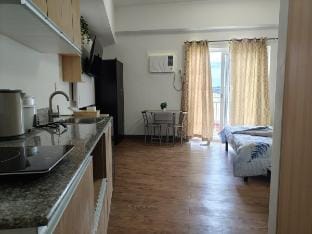 Cozy condo unit at Amani Grand near Cebu Airport Apartment in Lapu-Lapu City