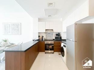 Bright 2‑Bed Family Home: Pool, Gym & Kids Play Vacation rental in Dubai