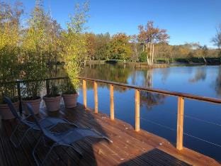 Chalet with a hot tub and terrace above the water Vacation rental in Normandy