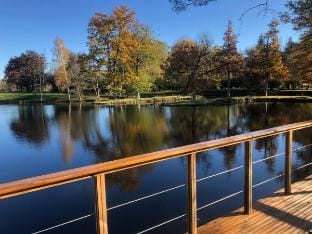 Chalet with a hot tub and terrace above the water Vacation rental in Normandy
