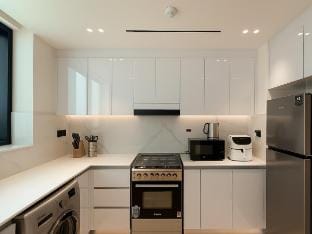 Big 1BR Apartment in JVC | Binghatti Corners Vacation rental in Dubai