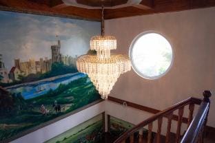 A room in Lustria’s White Castle Vacation rental in Iloilo City
