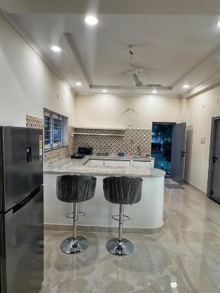 Saanvriya –Farmstay 3BR Moinabad-Pool By Homeyhuts Farm Stay in Hyderabad
