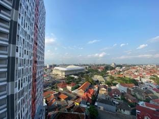 Warm Neutral 1BR at The Alton Apt By Travelio Apartment in Indonesia