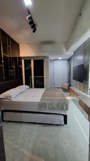 The Luxurious Room at Bella Apartement Vacation rental in Surabaya