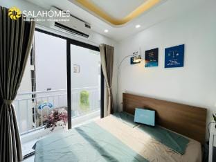 Căn hộ thoáng mát 1 ngủ 1 khách ngay Ngã Tư Sở Apartment in Laos