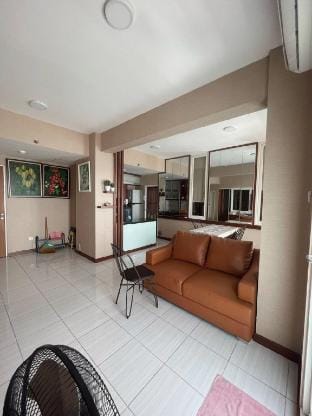 Apartemen Puncak Dharmahusada 3BR with cozy living Vacation rental in Surabaya