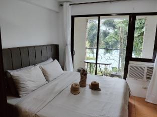 Condo Oasis with Balcony •King Size Bed  Vacation rental in Davao City