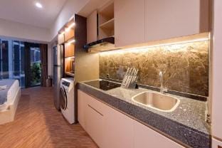 ModernRusticStudio Carstensz Residence By Travelio Apartment in West Java