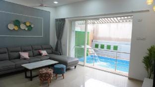 Taj Royal Villa (With Private Turf & Heated Pool) Villa in Lonavla