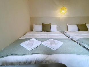 Ximending Quad Room No. 114302 Vacation rental in Taipei City
