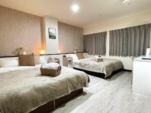Hankou Street《西門町｜四人房｜捷運6號出口步行8分鐘》54853[僅限境外旅客入住] Vacation rental in Taipei City