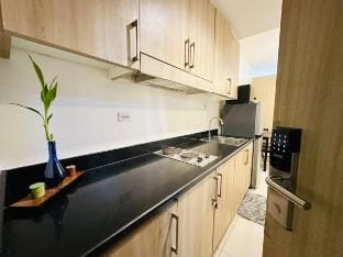 Seaside Tranquility: Cozy Suite in MOA w/ Netflix Apartment in Pasay