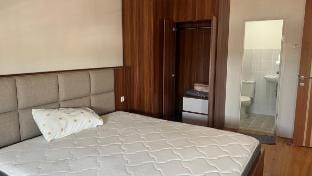 Cozy 2BR Apartment at Puncak Dharmahusada Vacation rental in Surabaya