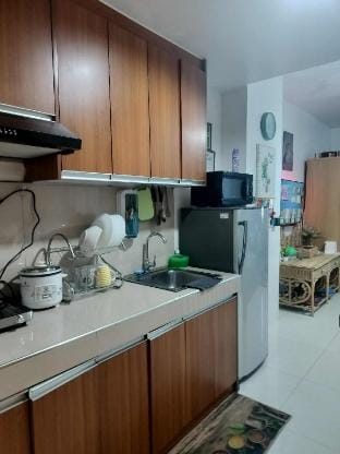 Tums MPlace Staycation 17th Floor Tower B Apartment in Quezon City