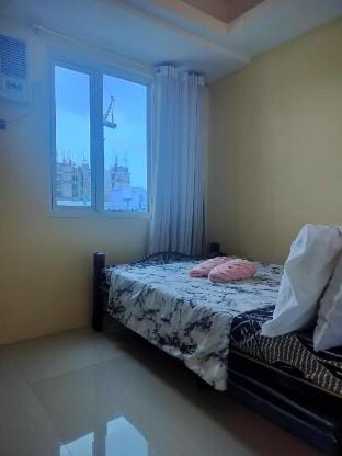 Tums MPlace Staycation 28th Floor Tower C Apartment in Quezon City