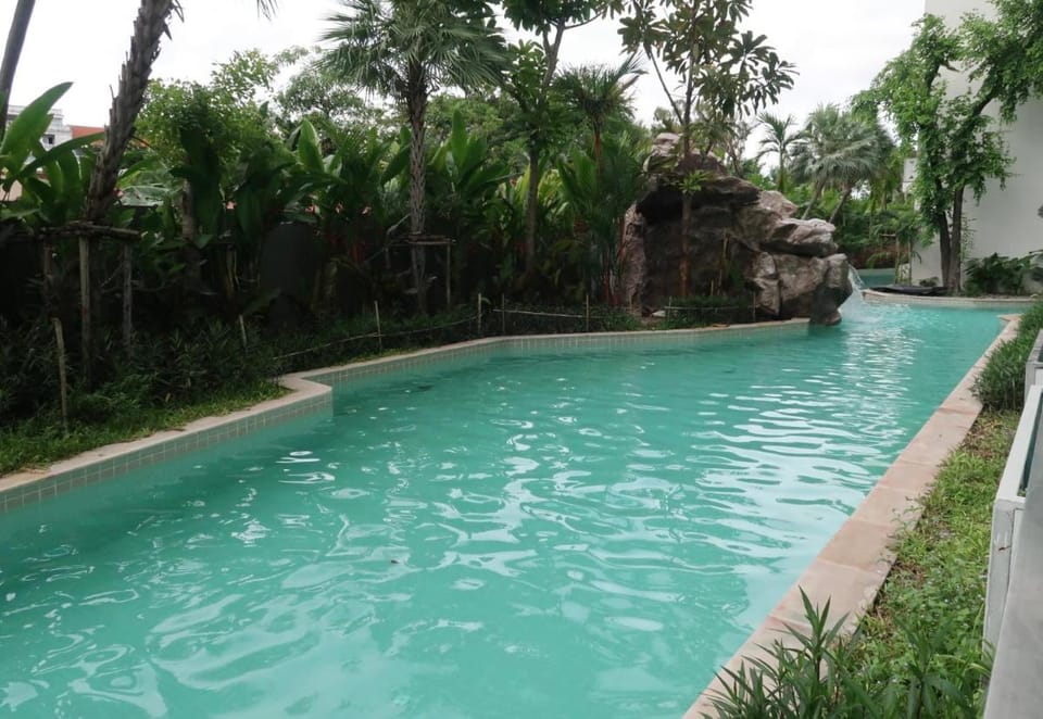 Amazon Residence Pool Villa Room by E&J Apartment in Pattaya City