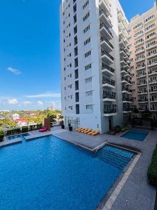 Tranquil Poolside Balcony Apartment in Iloilo City